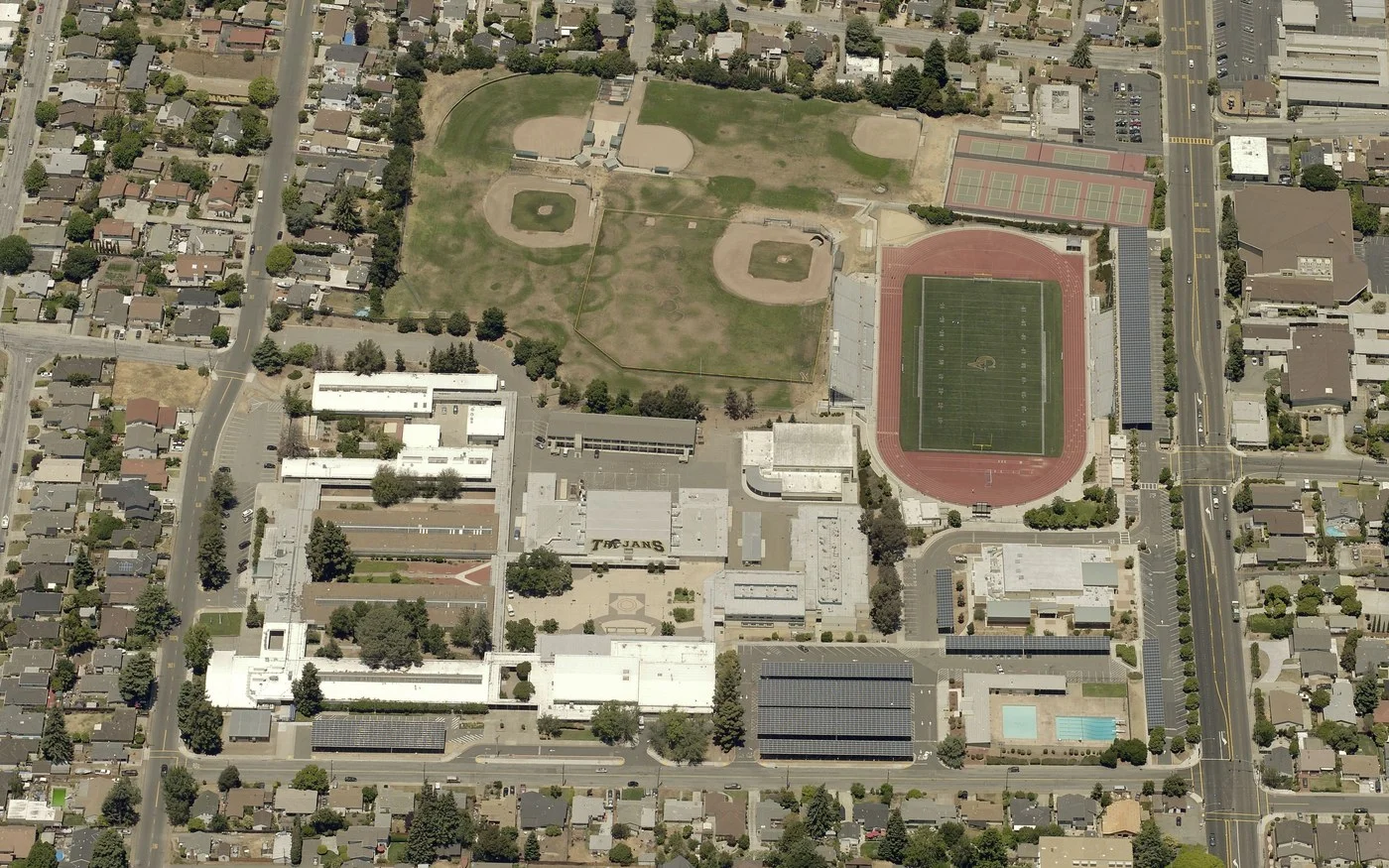 Aerial view of the Castro Valley High School campus with the parking canopy solar arrays in place
