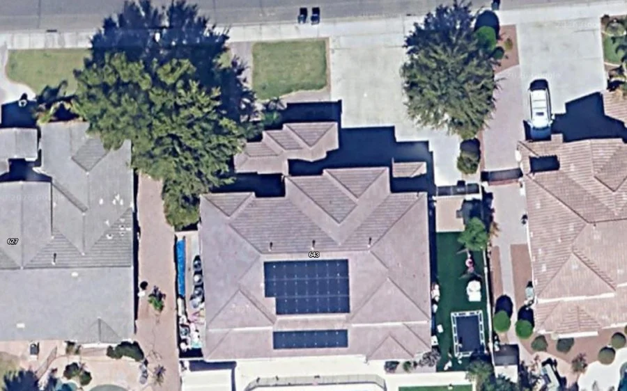 Aerial view of the residential rooftop solar install site, PV installation area marked